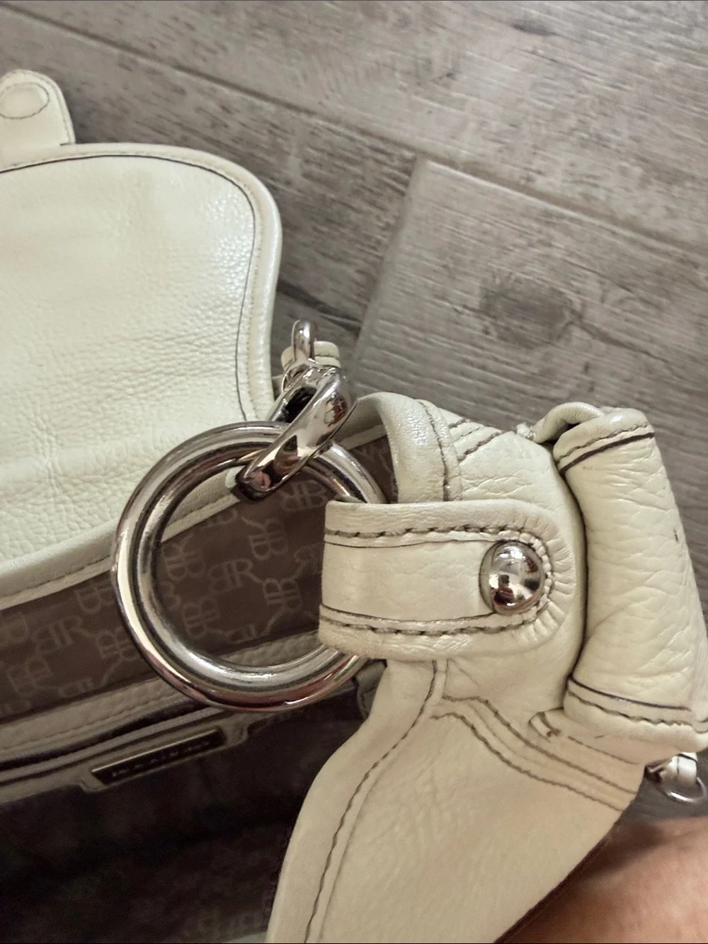 Banana Republic Cream Leather Shoulder Bag with Ring Detail needs good cleaning